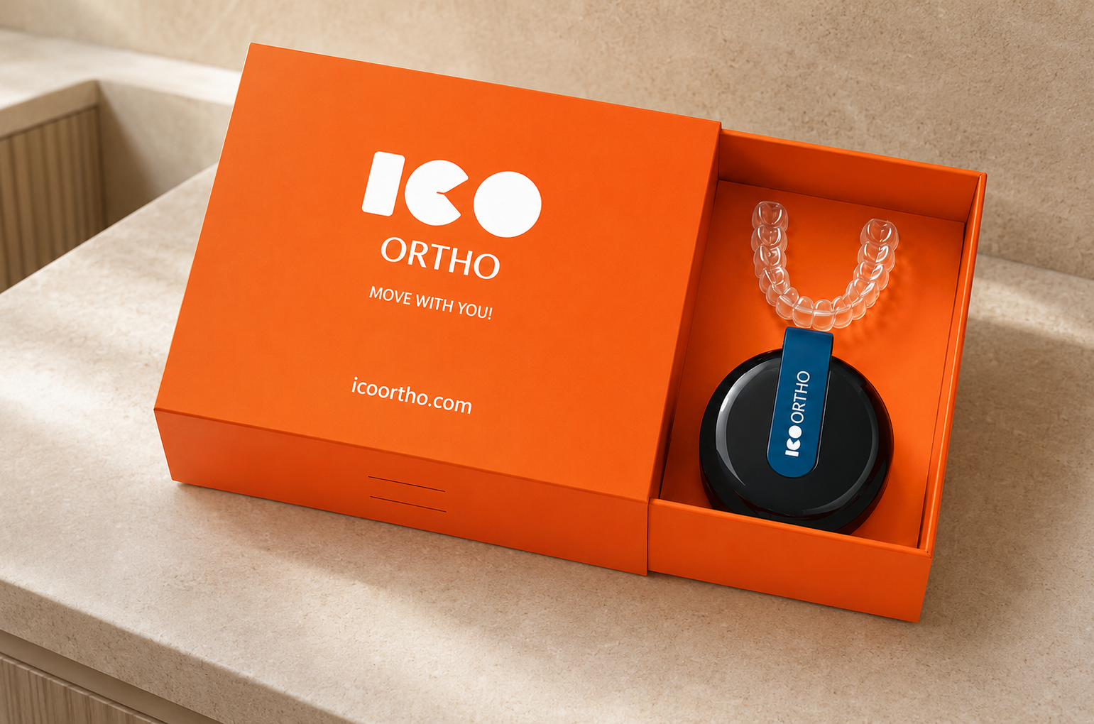 ICO ORTHO aligner kit in a warm, calm bathroom setting